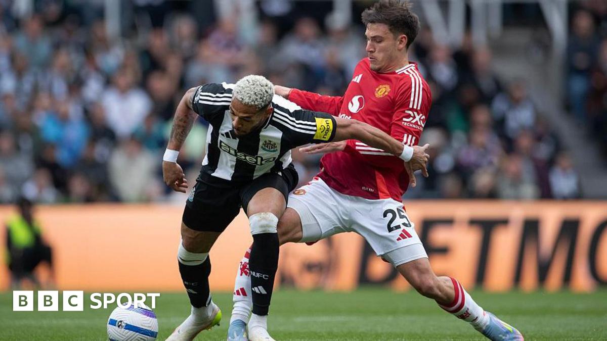 Joelinton of Newcastle United is challenged by Manuel Ugarte of Manchester United