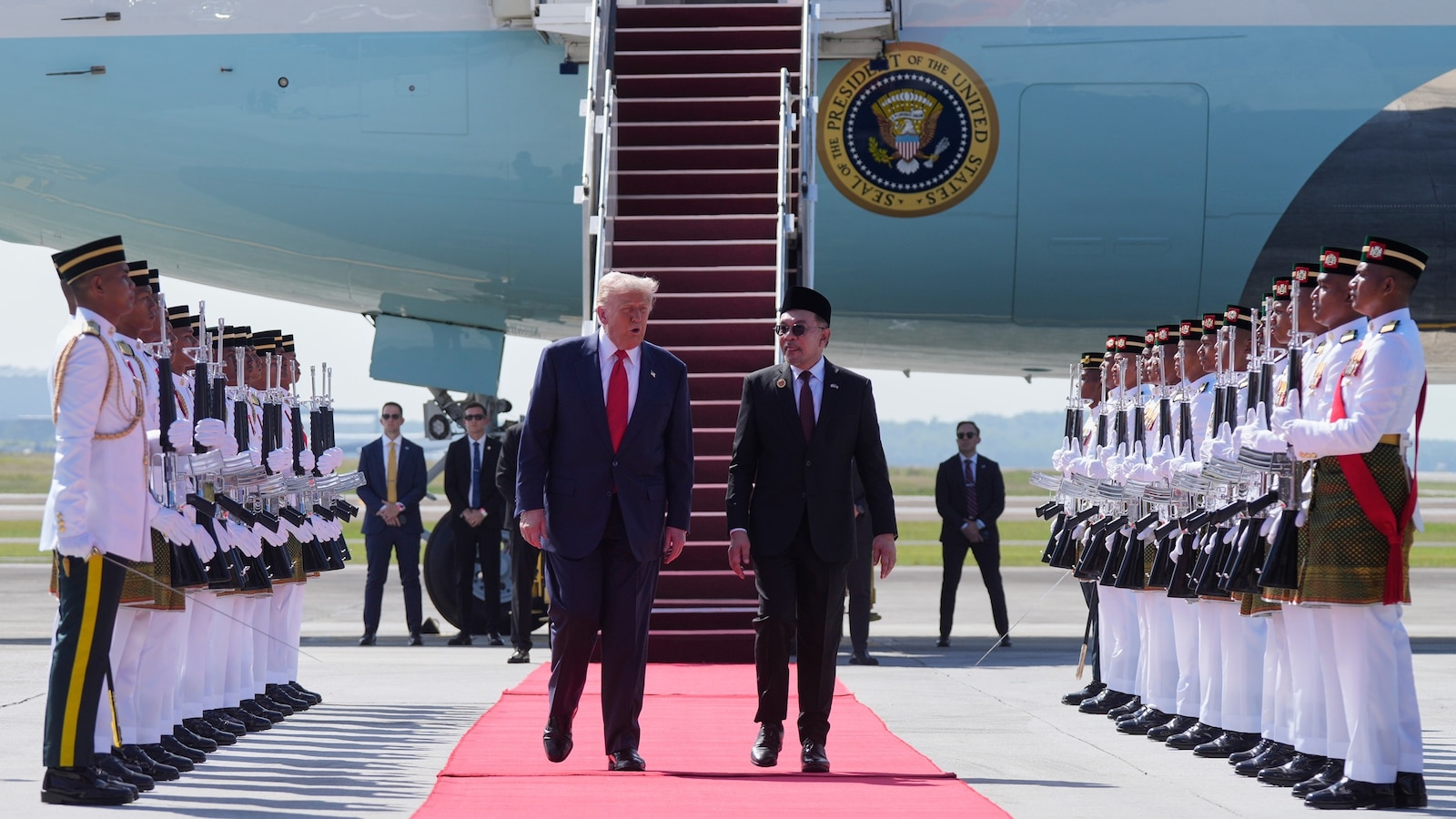 Trump arrives in Asia for week of key talks -- including with China's Xi