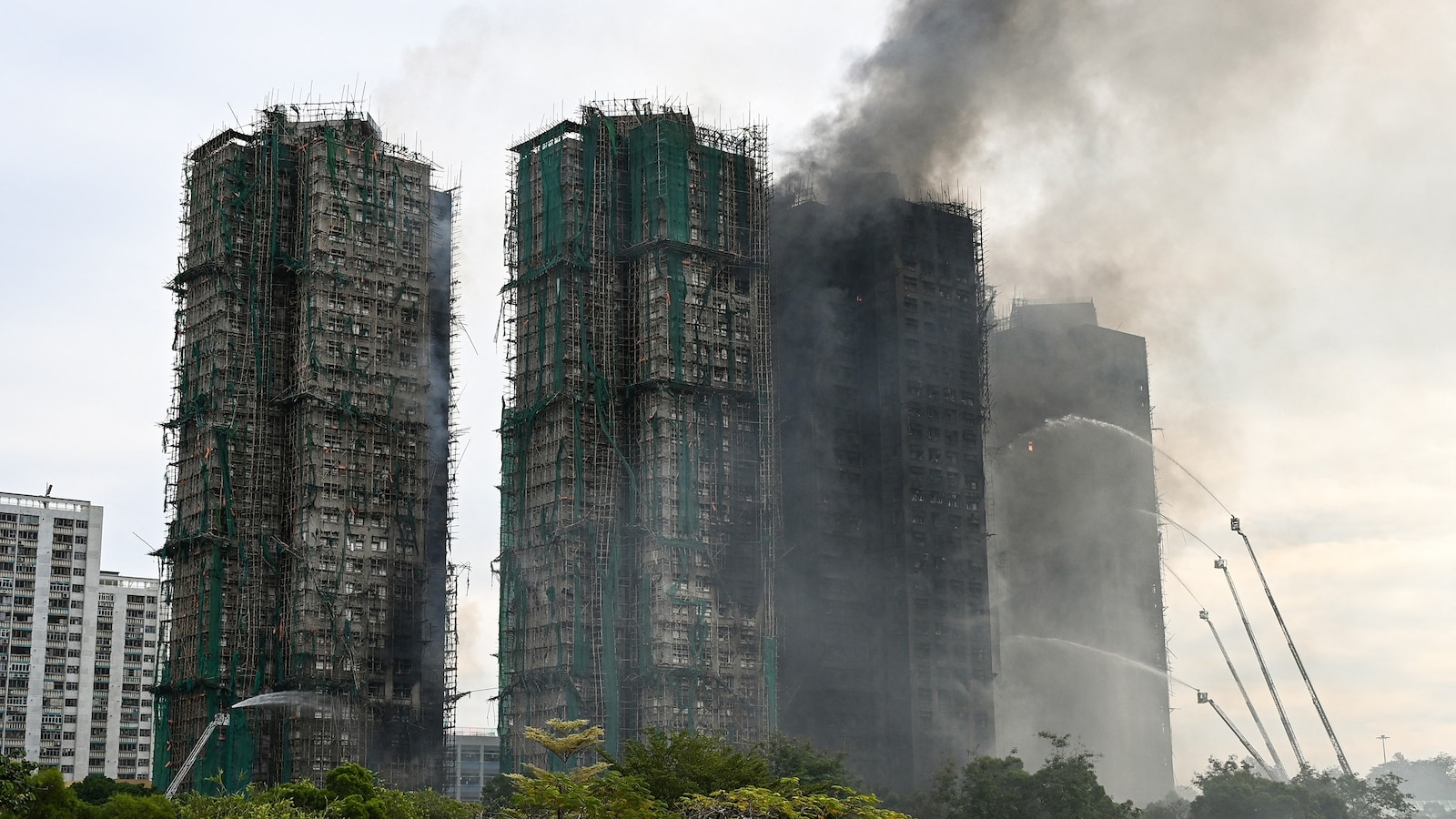 Hong Kong fire death toll rises to 128 people, officials say