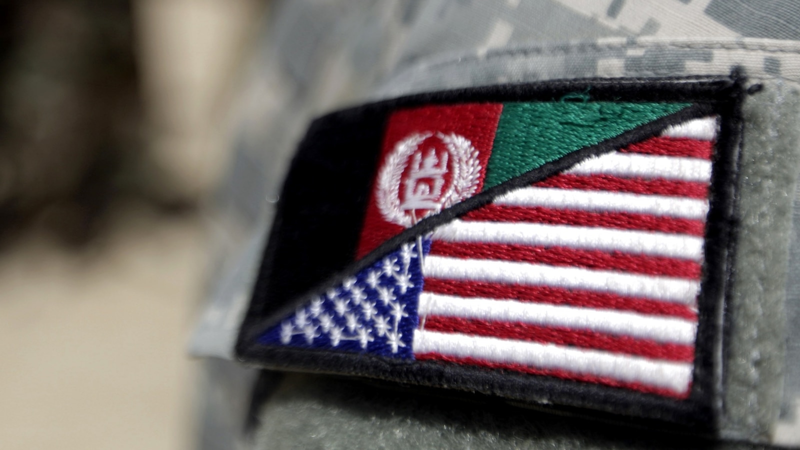 National Guard shooting suspect was likely vetted by US before being granted asylum