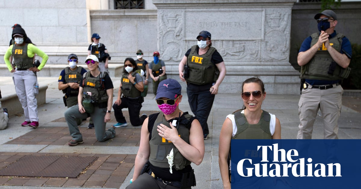 FBI agents fired for kneeling at racial justice protest sue to win jobs back | FBI