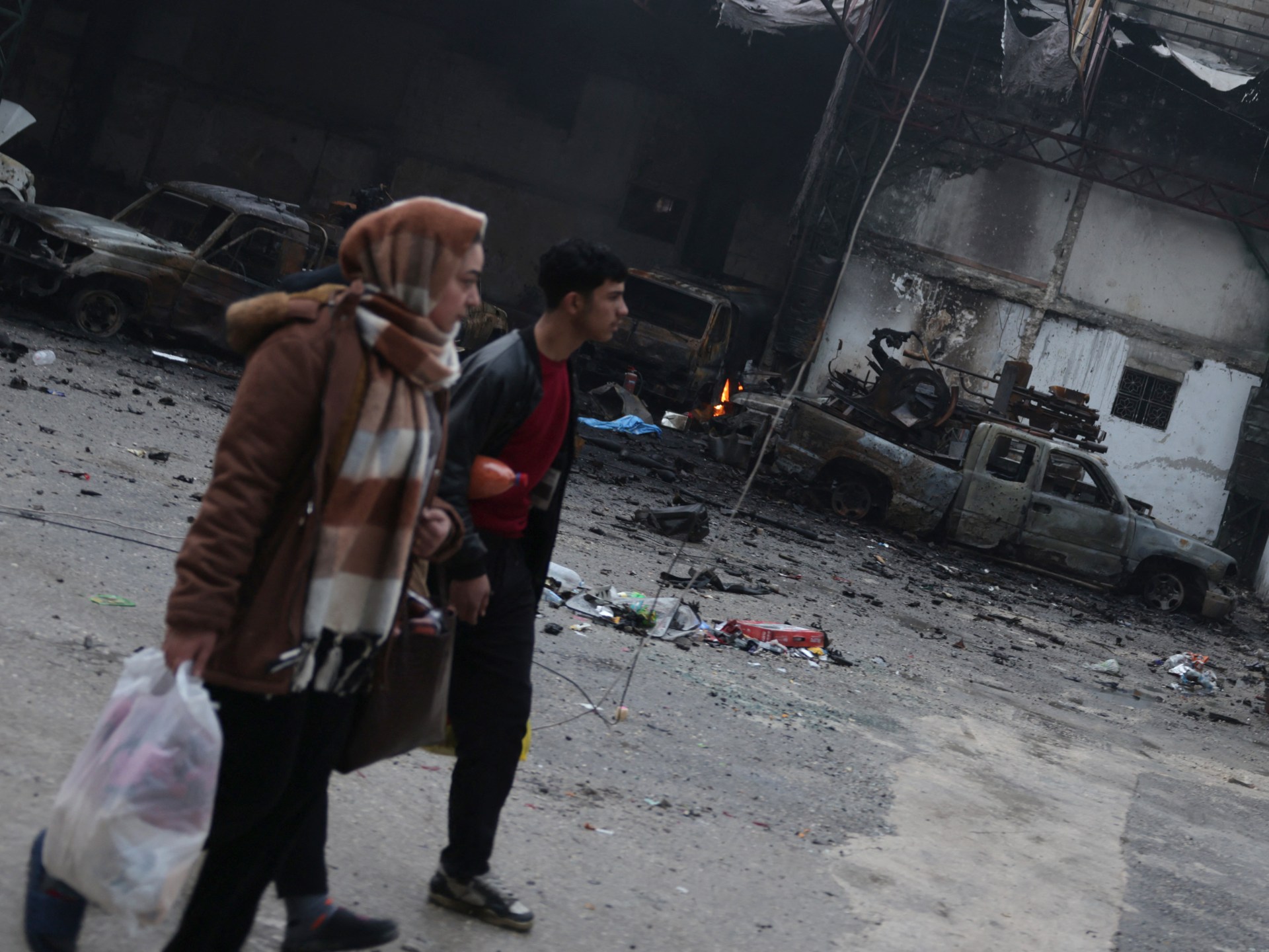 Syrians in Kurdish areas of Aleppo pick up pieces after clashes | Syria's War News