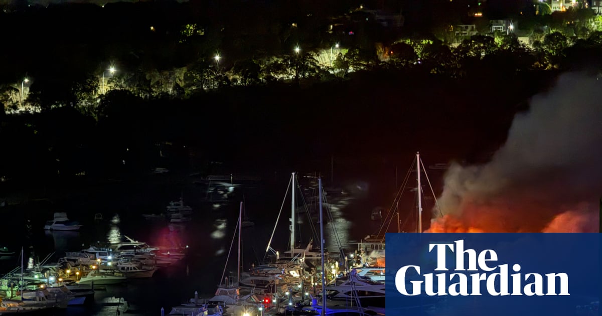 Three luxury yachts sink in Sydney as fire rips through exclusive Mosman marina | Australia news